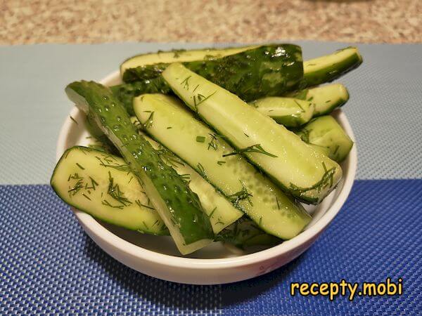 Lightly salted cucumbers in a bag with garlic