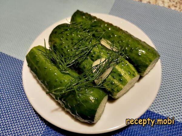 Lightly salted cucumbers in mineral water