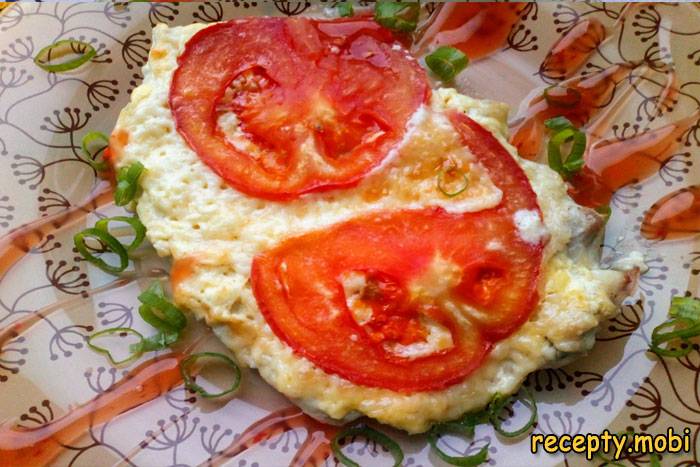 Baked chicken fillet with cheese and tomato
