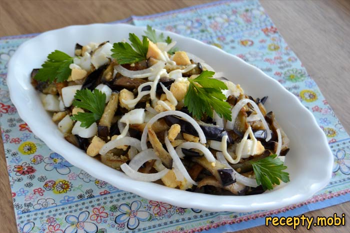 Eggplant salad with egg and pickled onions